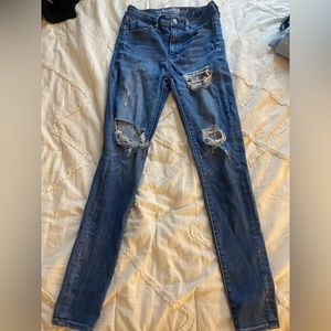 American Eagle dark wash jeans with rips